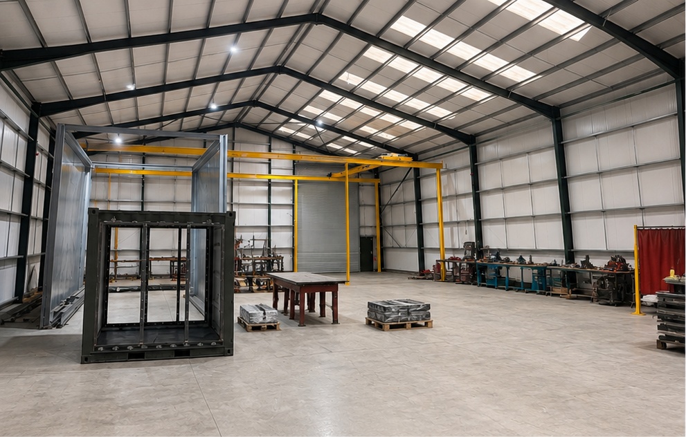 Inside the Fabrico workshop in Swadlincote — steel fabrication under the overhead gantry crane
